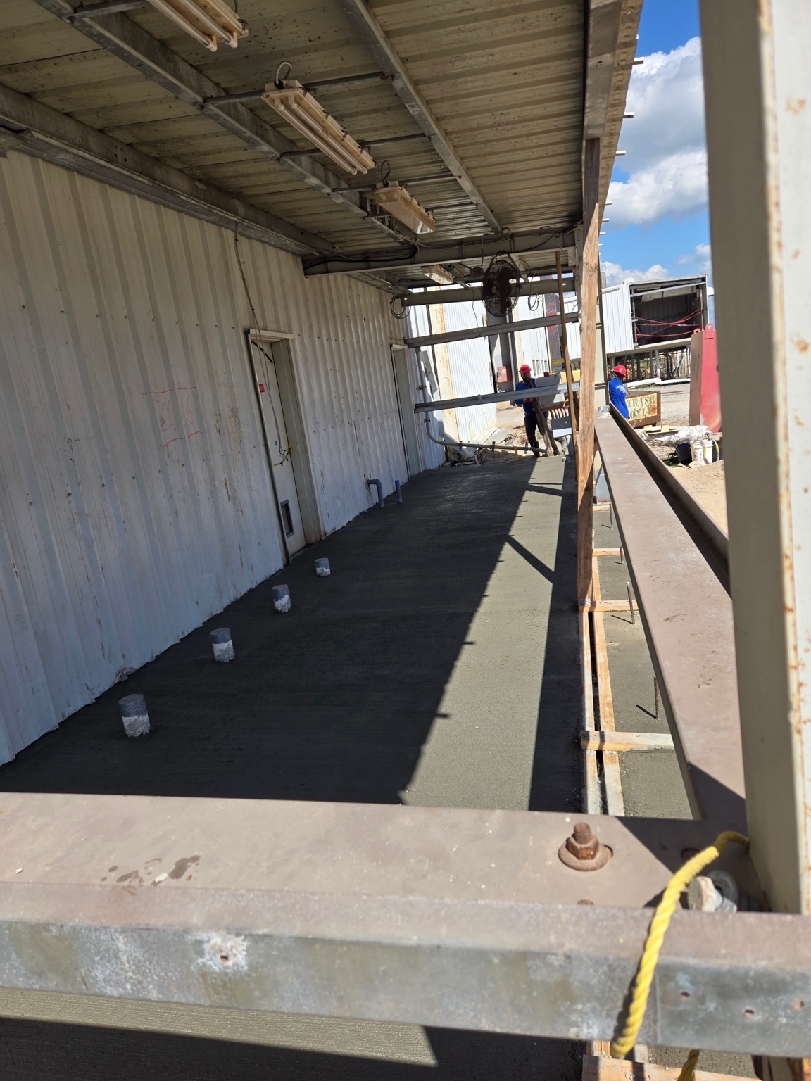 Covered porch with concrete slab